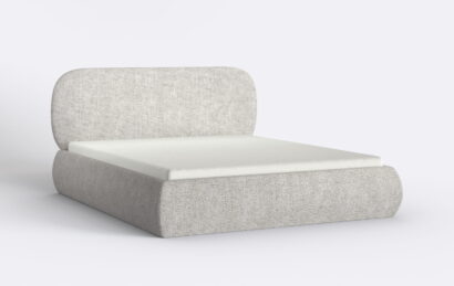 Łóżko do sypialni tapicerowane z materacem.